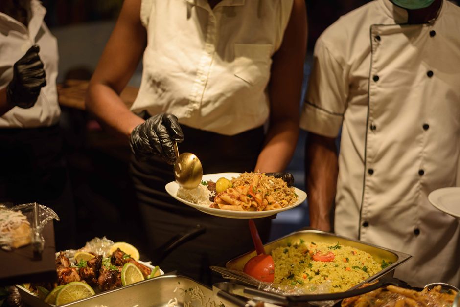 Professional catering staff serving guests